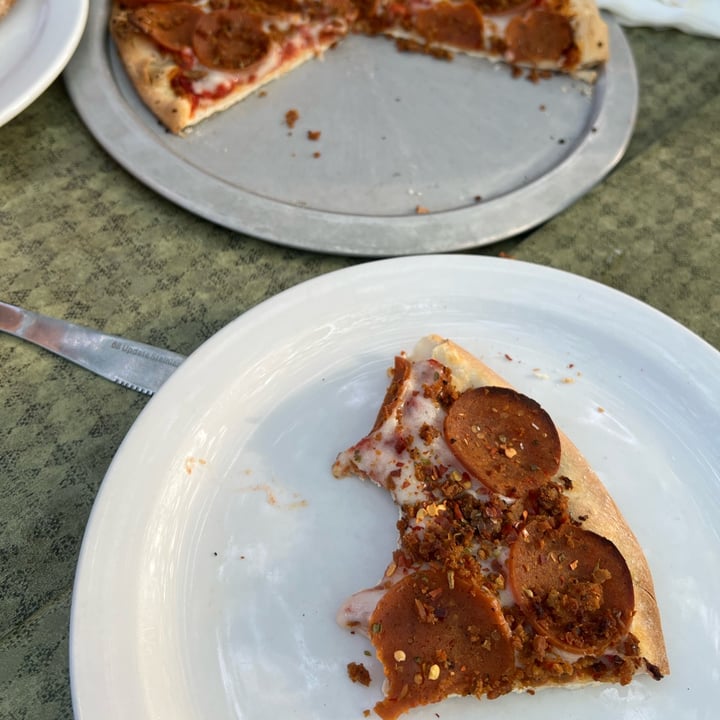 photo of Bazbeaux pizza with vegan cheese, vegan pepperoni, & vegan sausage shared by @theveganintersection on  04 Jun 2022 - review