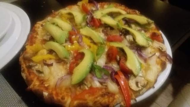 Photo of the dish “Vegetarian Pizza with Vegan Cheese (Added Avocado)”