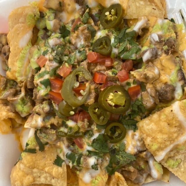 Foto do prato “carnitas nachos”