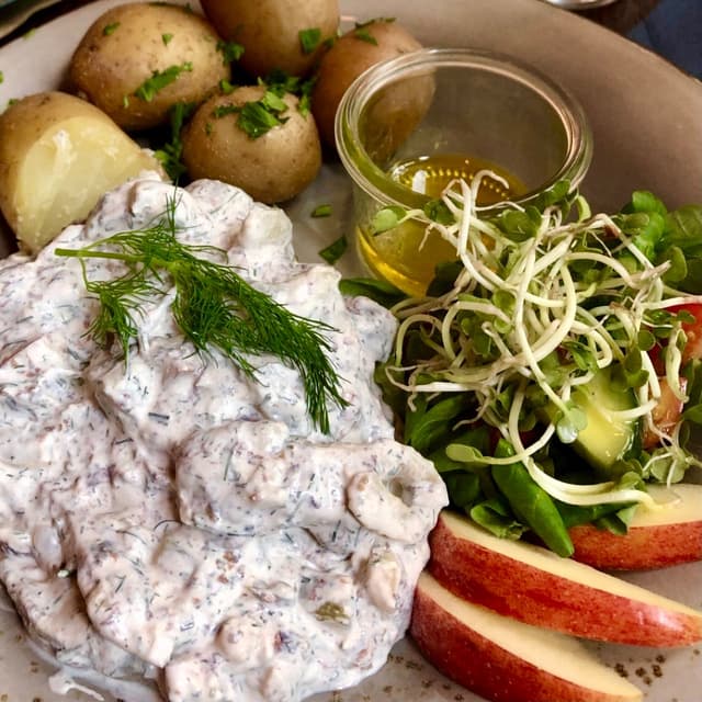 「Aubergine pickled in cream with potatoes and salad」の料理の写真