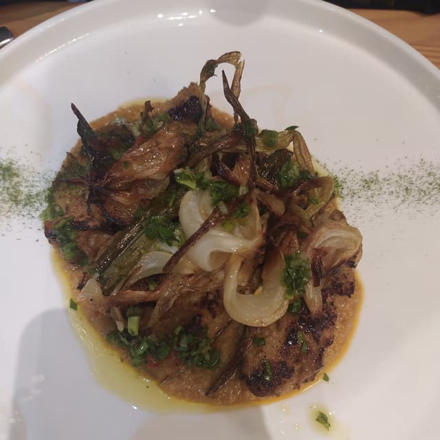 Photo of the dish “Seitan Salsa Romesco, Cipollotto Arrosto E Chimichurri”