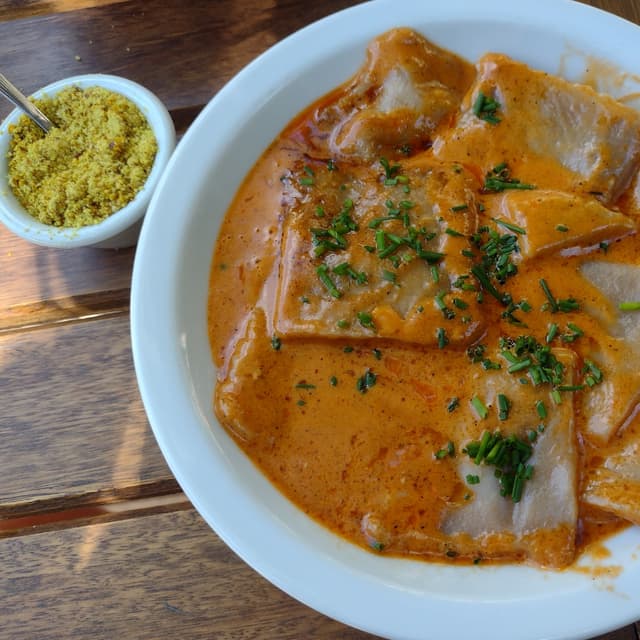 Photo of the dish “Ravioles Con Salsa De Morrones Asados”