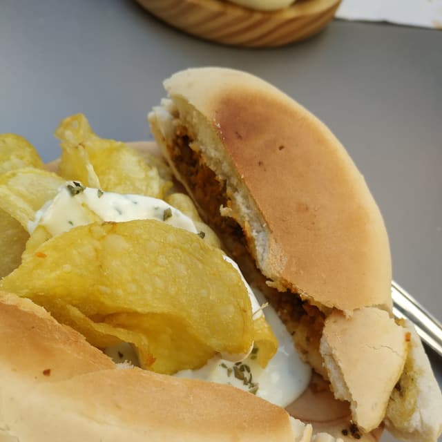 Foto do prato “Montadito de chorizo picante”