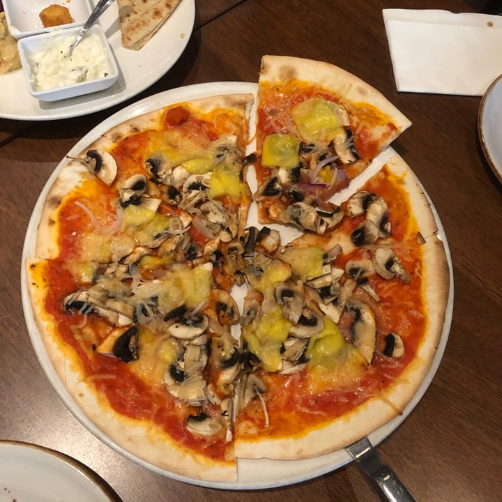 review photo of Original Sin Mediterranean Restaurant Funghi pizza shared by @belleeats on 25 May 2022 - review
