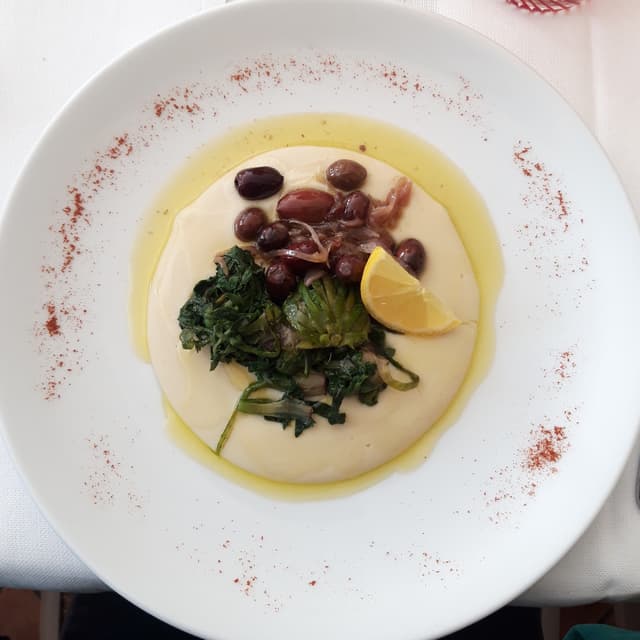 Photo of the dish “Crema di Fave Con Olive e Cipolle Caramellate”