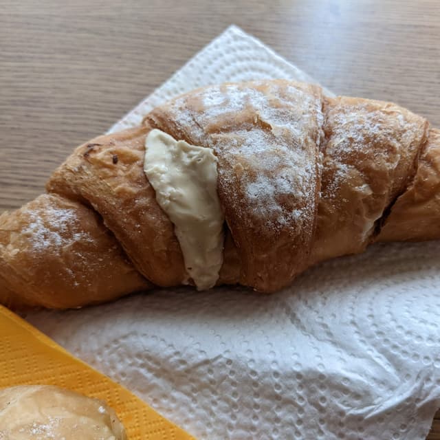 Foto del plato “Brioche Vegana Con Crema All'arancia”