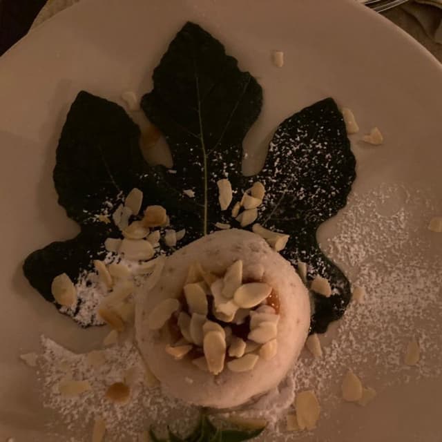 Photo of the dish “semifreddo ai fichi e alla mandorla”