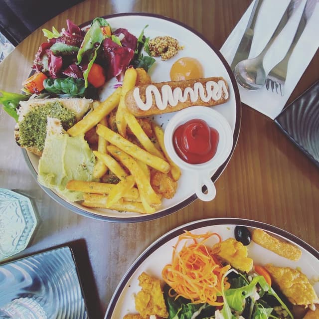 Photo of the dish “Beyond Sausage Plate and French Fries”