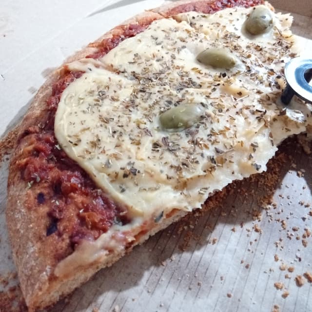 Photo of the dish “Pizza integral-muzzarella y oregano”