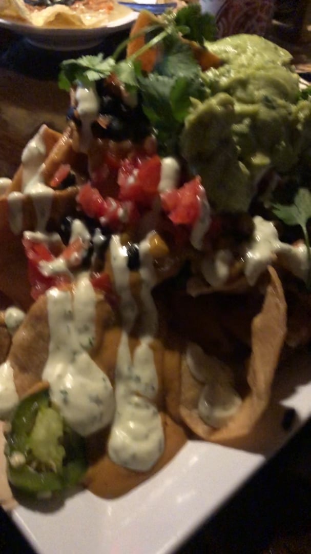 review photo of No Bones Beach Club Nachos with Guacamole shared by @kaylalamberson on 02 Jan 2020 - review