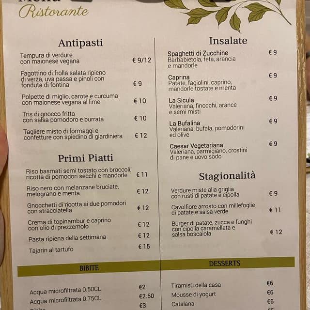 Photo du plat “Riso venere con melanzane menta e melograno”