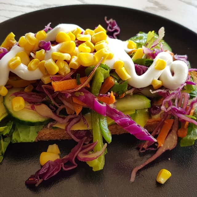 Photo of the dish “Avo and Rainbow Slaw Toast”