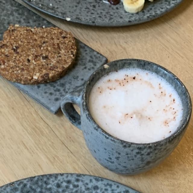 Photo of the dish “oat milk cappuccino and chocolate chips cookie”