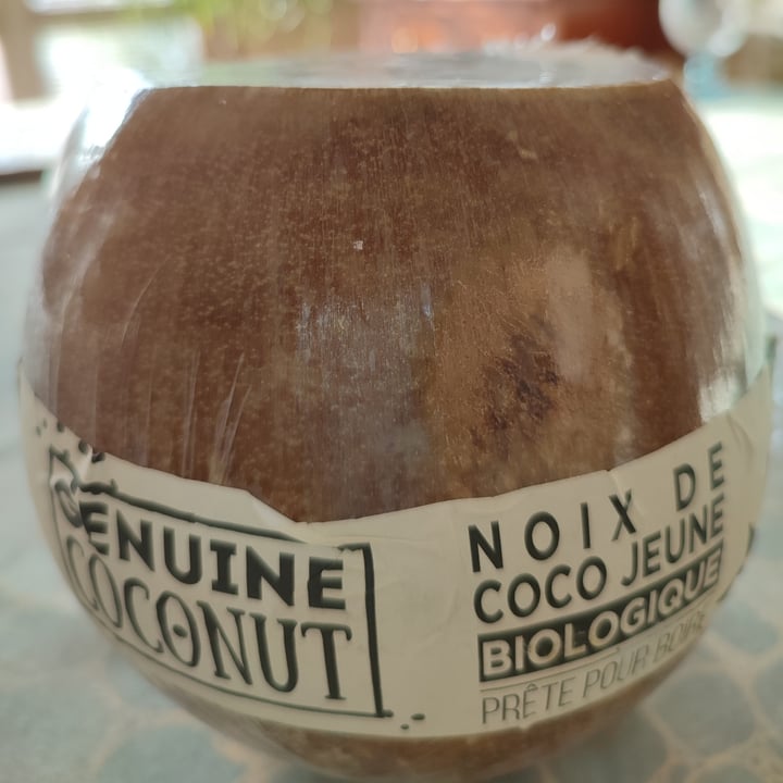 photo of Genuine Coconut Fresh Organic Coconut with a straw and a bamboo stick shared by @frenchvegangirl on  14 Mar 2022 - review