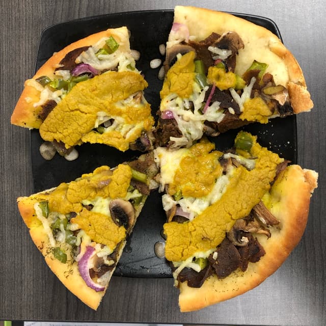 Photo of the dish “Philly Cheezesteak pizza”
