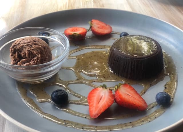 Photo of the dish “MOCHA SALTED CARAMEL CHOCOLATE LAVA CAKE WITH GELATO”