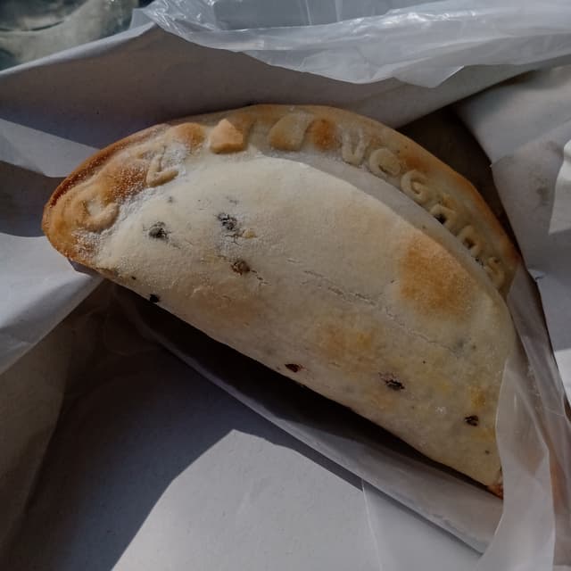 菜肴“Empanada de Calabaza, choclo y muzza”的照片