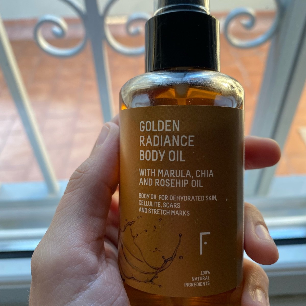 Golden radiance body oil deals