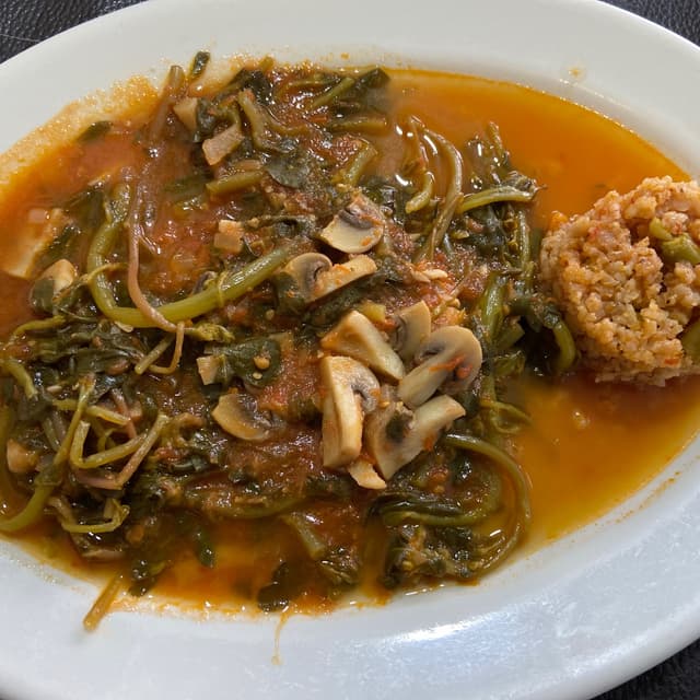 Foto del plato “Verdolagas con champiñones”