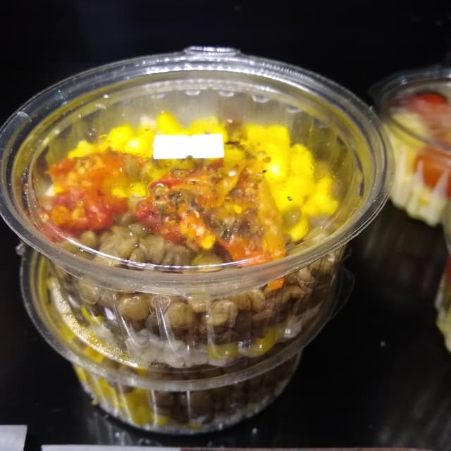 Photo of the dish “Picoteo De Arroz Yamaní Tomates Secos Choclo Y Lentejas”