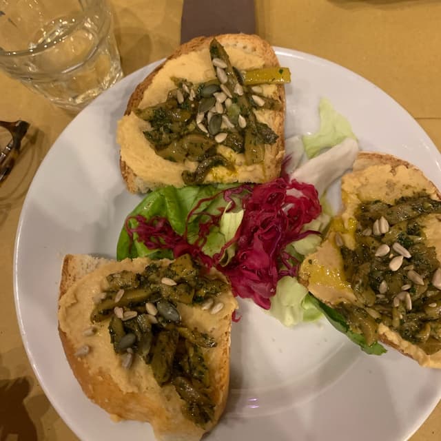 Photo of the dish “Crostini Con Melanzane Trifolate”
