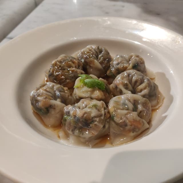 Foto do prato “Steam Dumplings”