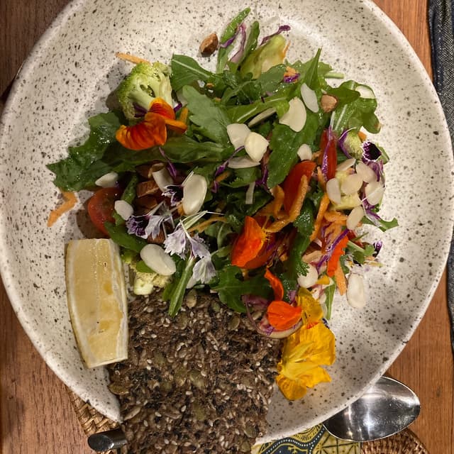 Photo of the dish “The Spicoli Sprouted Salad”