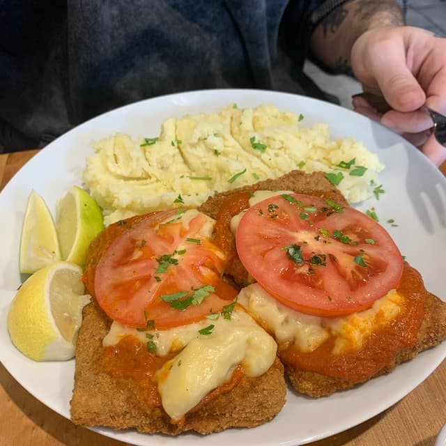 Photo of the dish “Suprema A La Napolitana Con Guarnición”