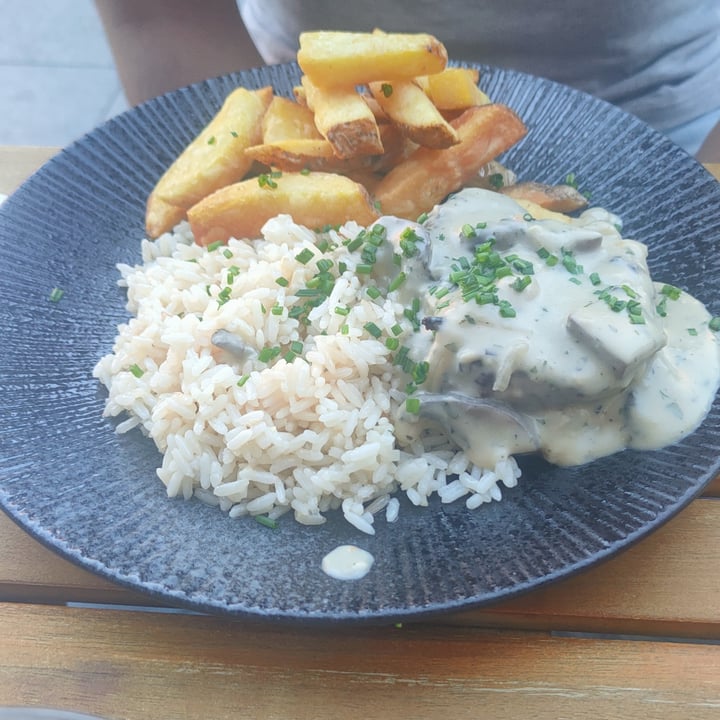 photo of Veginity Grilled Seitan Steak with Garlic Rice, triple cooked Chips and a rich Mushroom Coffee Cream Sauce shared by @claudiaavgenova on  14 Aug 2022 - review