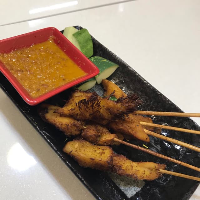 Photo of the dish “Golden Mushroom Satay”