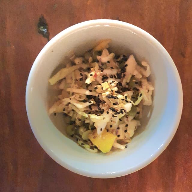 Foto del plato “Salada Repolho Com Manga”