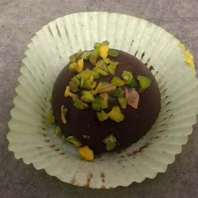 Foto do prato “Pasticcino al Cioccolato e Pistacchio”