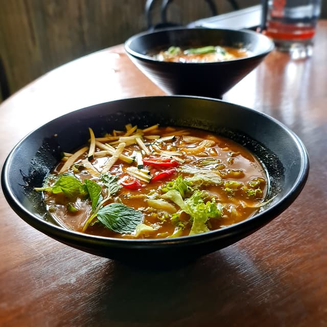 Foto do prato “Signature Asam Laksa”