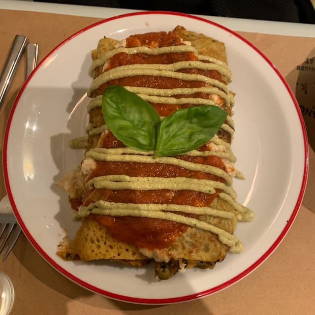Photo of the dish “canelones Con Salsa”