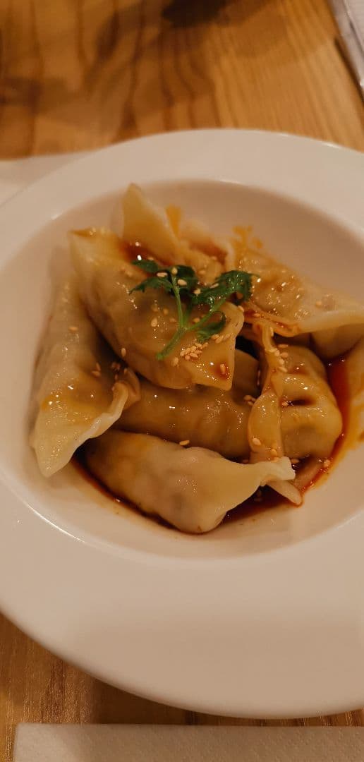 Foto del piatto “Dumplings With Chilli Sauce”