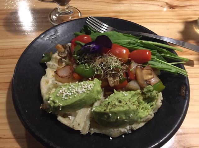 Photo of the dish “Waffle de Yuca y Champiñones”