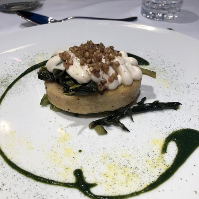 Foto do prato “Polenta con formaggio di mandorla”