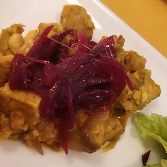 Photo of the dish “Tempeh Con Cipolle Caramellate”
