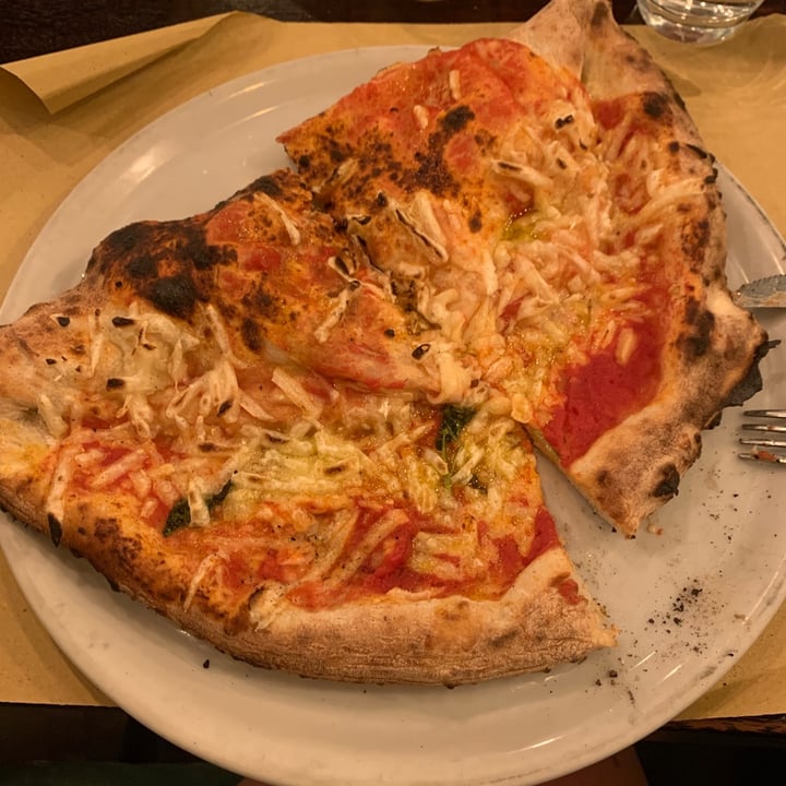 photo of Origano Pizza mezzaluna shared by @gliunicorniviola on  15 Aug 2021 - review