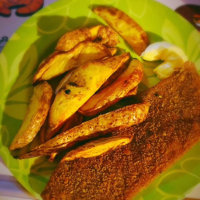 Photo of the dish “Milanesa Con Papas”