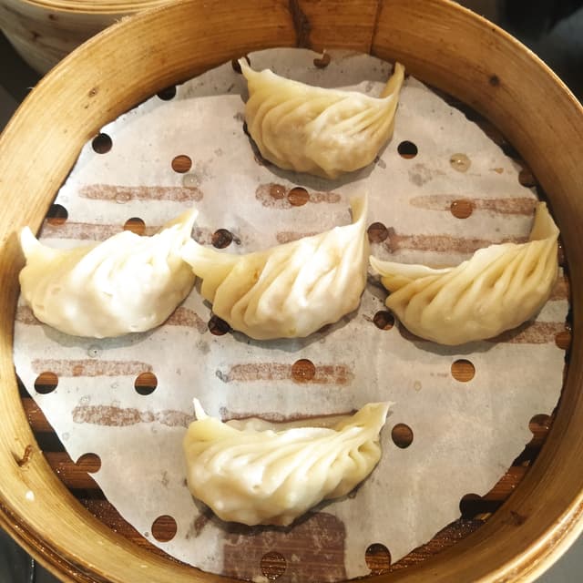 Foto del piatto “Dumpling Con Verdure E Arachidi Tostate”