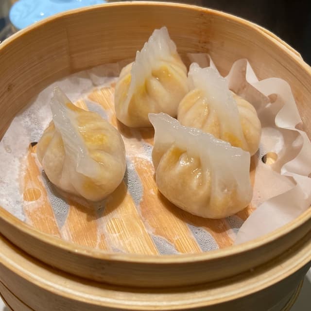 菜肴“Ravioli con zucca e nocciola”的照片