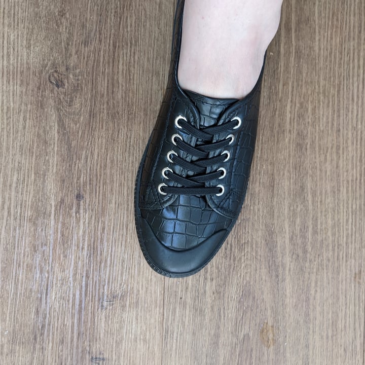 review photo of New Look black faux croc lace up trainers shared by @stephiewaite on 29 May 2022 - review