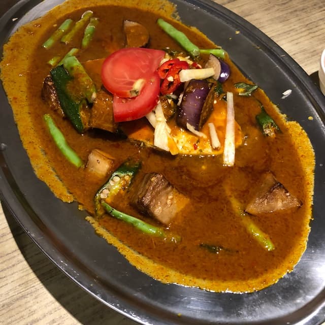 Foto del piatto “Ikan Assam Pedas”