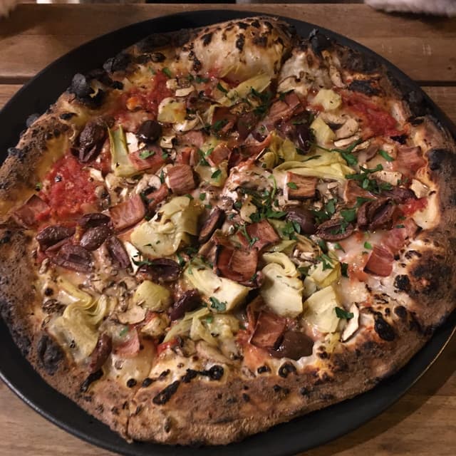 Photo of the dish “Capricciosa Pizza”
