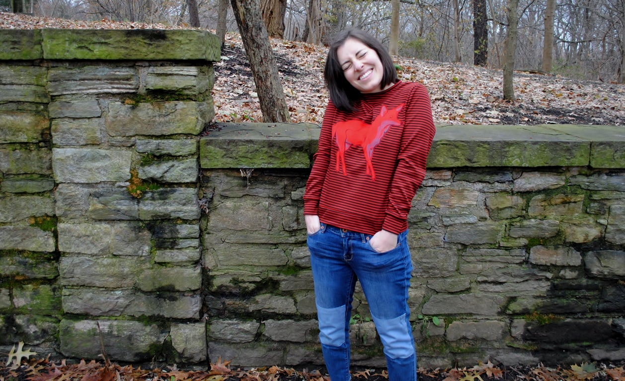 Not sure what's the most adorable here. The sweater or the girl.