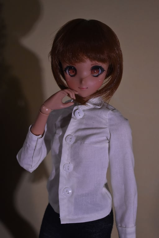 Simone worn by a doll