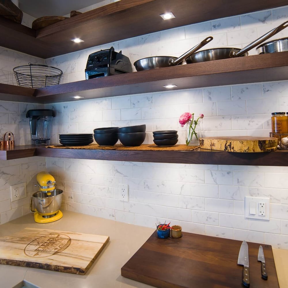 Project_Kitchens_Old+South3 Old South Kitchen project by Casey's Kitchens featuring dark walnut open shelves, white subway tile backsplash, a bright yellow KitchenAid mixer, and black bowls with copper accents, Chad Stewart’s workspace vibe.
