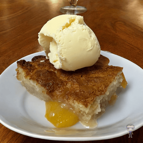 peach cobbler with vanilla ice cream