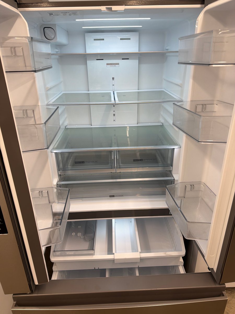 Photo 2 of this exact Whirlpool Stainless steel french door refrigerator